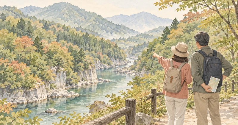 まじま荘での温泉旅をイメージして渓谷を眺める夫婦