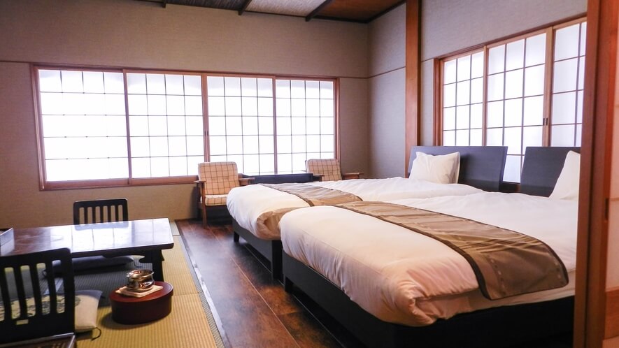 和洋室

ゆったりセミダブルベッドを2台設置した和洋室タイプのお部屋です。